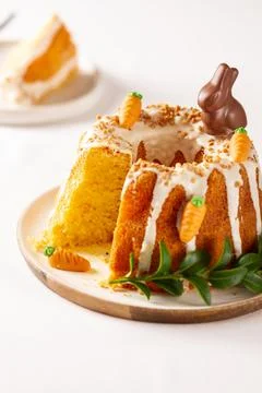 Easter lemon cake with icing and easter decoration. Easter gugelhupf cake wit Stock Photos