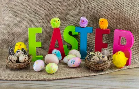 Easter with letters and jute background Stock Photos