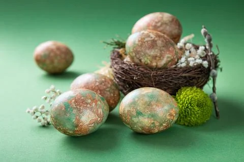 Easter marble eggs with spring flowers Stock Photos