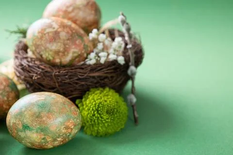 Easter marble eggs with spring flowers Stock Photos