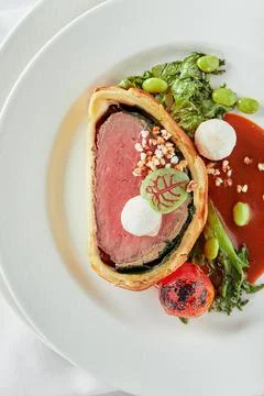 Easter meat roll, meatloaf for Easter dinner. Beautifully decorated catering Stock Photos