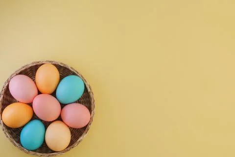 Easter minimalistic background with colorful Easter eggs in pastel colors in a Stock Photos