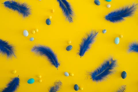 Easter minimalistic flat lay on yellow background Stock Photos