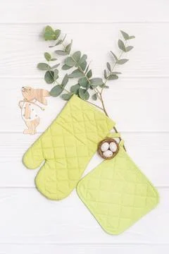 Easter mockup, kitchen accessory. Cooking mitten, oven-glove. Flat lay with copy Stock Photos