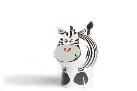 Easter or spring figure zebra shaped egg isolated white background Stock Photos