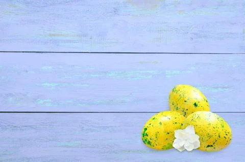 Easter painted eggs with an abstract pattern. On a wooden blue background. Stock Photos