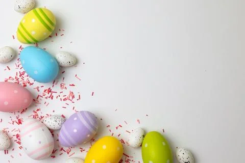 Easter painted eggs on a bright background. Easter background. Place for text Stock Photos