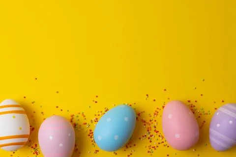 Easter painted eggs on a bright background. Easter background. Place for text Stock Photos