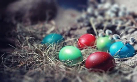 Easter painted eggs on burlap 스톡 사진