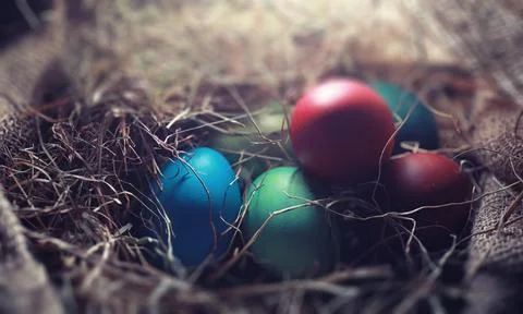 Easter painted eggs on burlap 写真素材