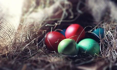 Easter painted eggs on burlap 스톡 사진