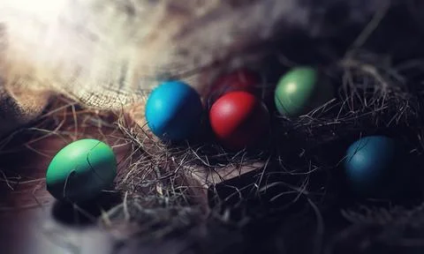 Easter painted eggs on burlap 스톡 사진