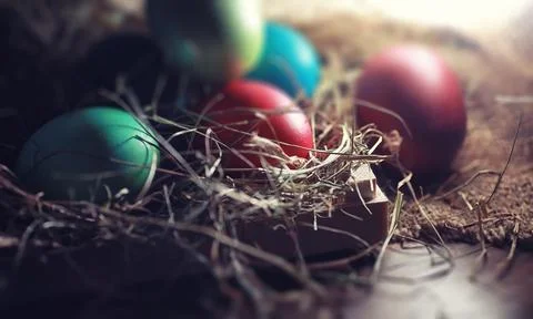 Easter painted eggs on burlap 스톡 사진