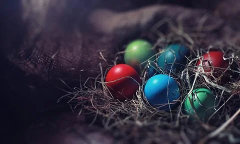 Easter painted eggs on burlap 스톡 사진