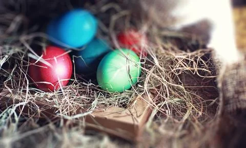 Easter painted eggs on burlap 스톡 사진