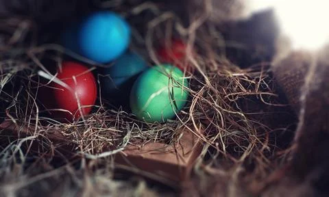 Easter painted eggs on burlap 스톡 사진