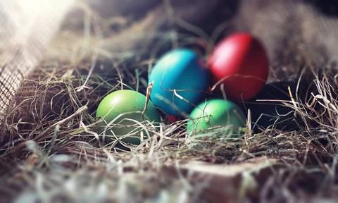 Easter painted eggs on burlap 스톡 사진