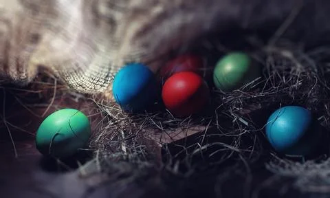 Easter painted eggs on burlap 写真素材