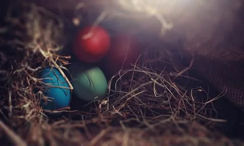 Easter painted eggs on burlap 写真素材