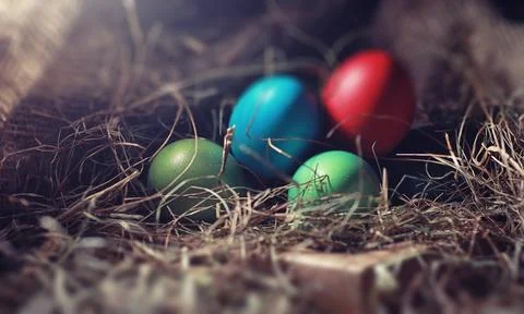 Easter painted eggs on burlap 스톡 사진