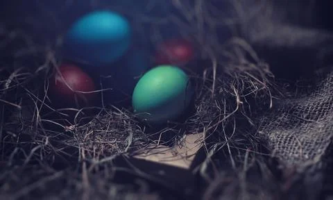 Easter painted eggs on burlap 스톡 사진