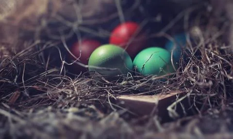 Easter painted eggs on burlap 스톡 사진