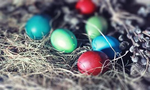 Easter painted eggs on burlap 스톡 사진