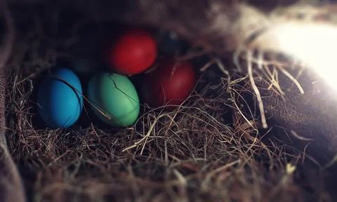 Easter painted eggs on burlap 스톡 사진