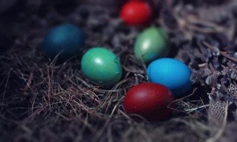 Easter painted eggs on burlap 스톡 사진
