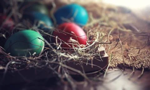 Easter painted eggs on burlap 스톡 사진