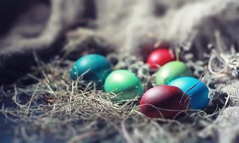 Easter painted eggs on burlap 스톡 사진
