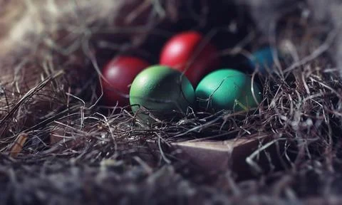 Easter painted eggs on burlap 스톡 사진