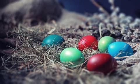 Easter painted eggs on burlap 스톡 사진