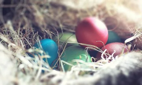 Easter painted eggs on burlap 스톡 사진