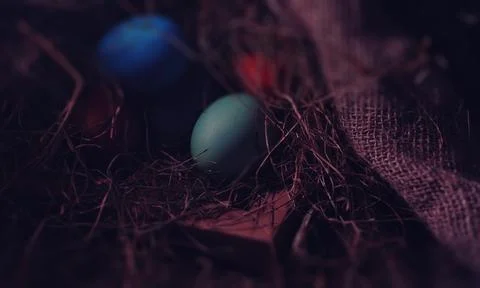 Easter painted eggs on burlap 스톡 사진