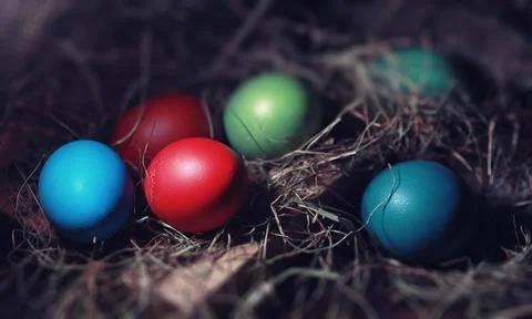 Easter painted eggs on burlap 스톡 사진
