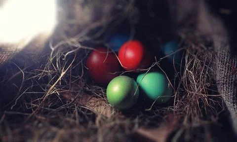 Easter painted eggs on burlap 库存照片