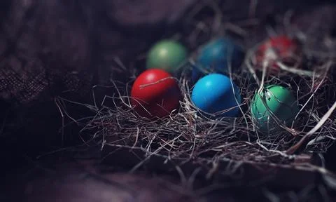 Easter painted eggs on burlap 库存照片