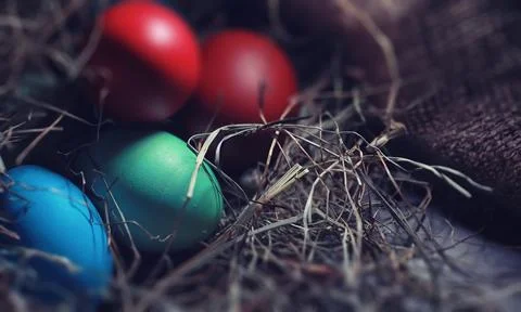 Easter painted eggs on burlap 스톡 사진