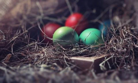 Easter painted eggs on burlap 스톡 사진