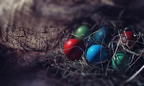 Easter painted eggs on burlap 스톡 사진