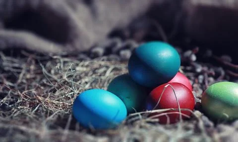 Easter painted eggs on burlap 写真素材