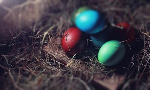 Easter painted eggs on burlap 스톡 사진
