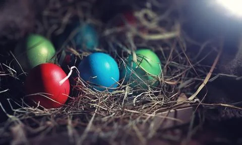 Easter painted eggs on burlap 스톡 사진