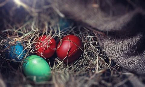 Easter painted eggs on burlap 写真素材