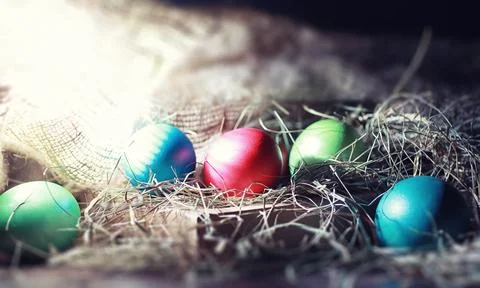 Easter painted eggs on burlap 스톡 사진