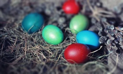 Easter painted eggs on burlap 스톡 사진