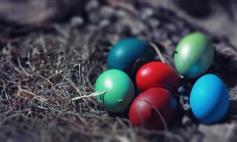 Easter painted eggs on burlap 写真素材