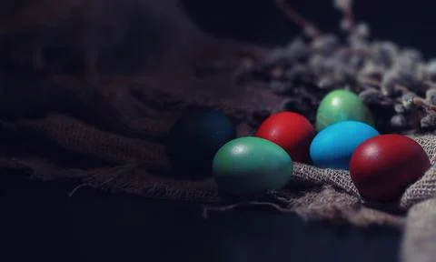 Easter painted eggs on burlap Foto stock