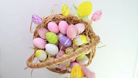 Easter. Painted eggs for Easter on a white background in a basket. Colored eggs Stock Footage 173372759